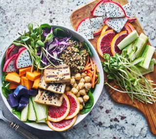 grilled tofu and dragon fruit buddha bowl top view